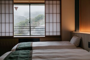 スーペリア ツインルーム | セーフティボックス (室内)、デスク、WiFi (無料)、ベッドシーツ