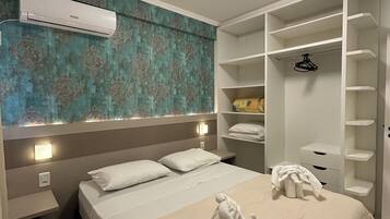 Family Apartment, Lanai | 1 bedroom, blackout drapes, free WiFi, bed sheets