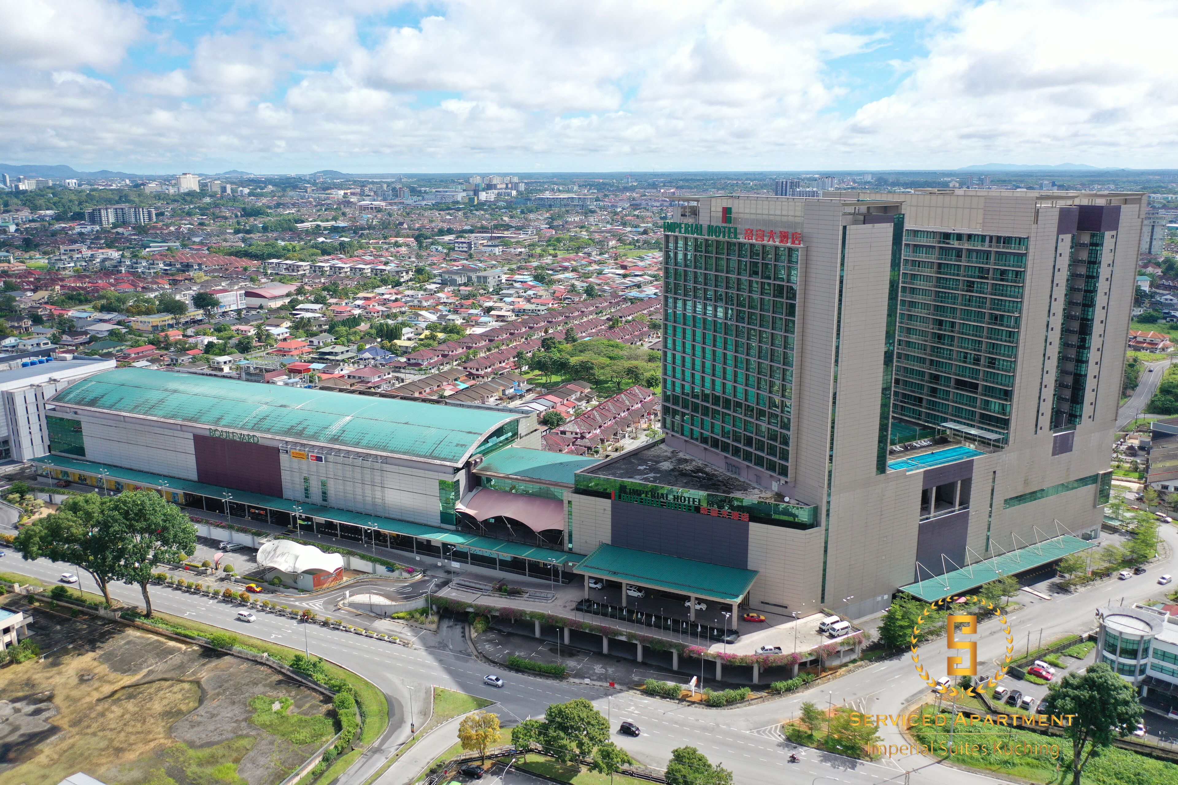 An aerial view of a hotel complex with a prominent building labeled "Imperial Hotel."