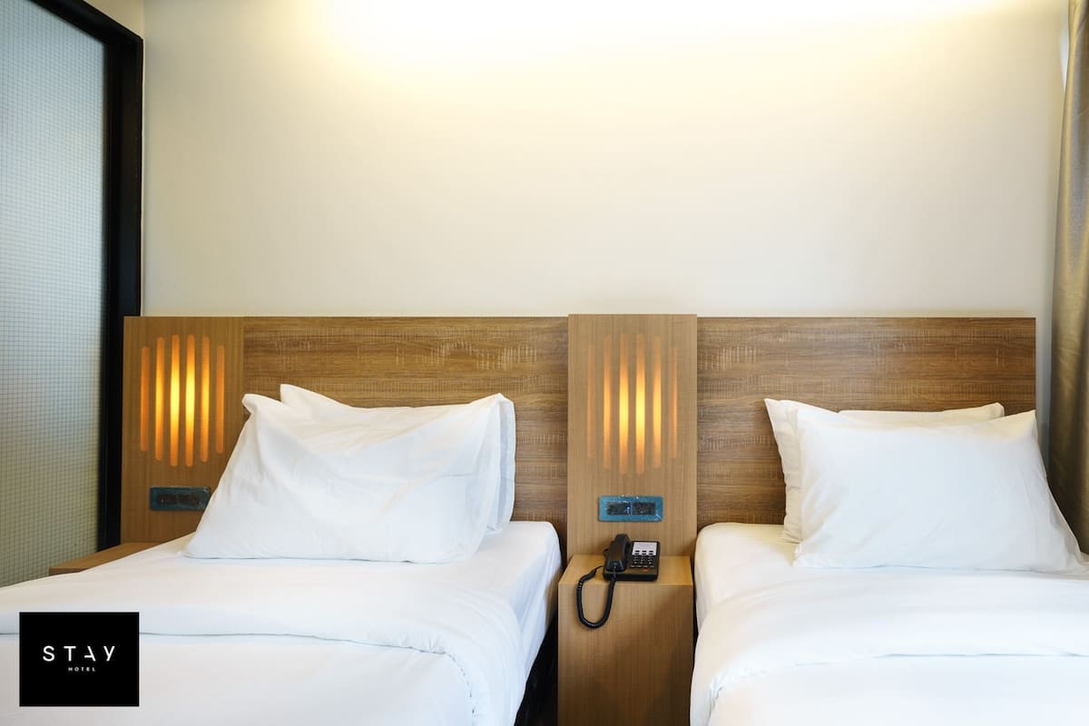 Phòng Deluxe, 2 giường đơn | Két bảo mật tại phòng, màn/rèm cản sáng, phòng cách âm 