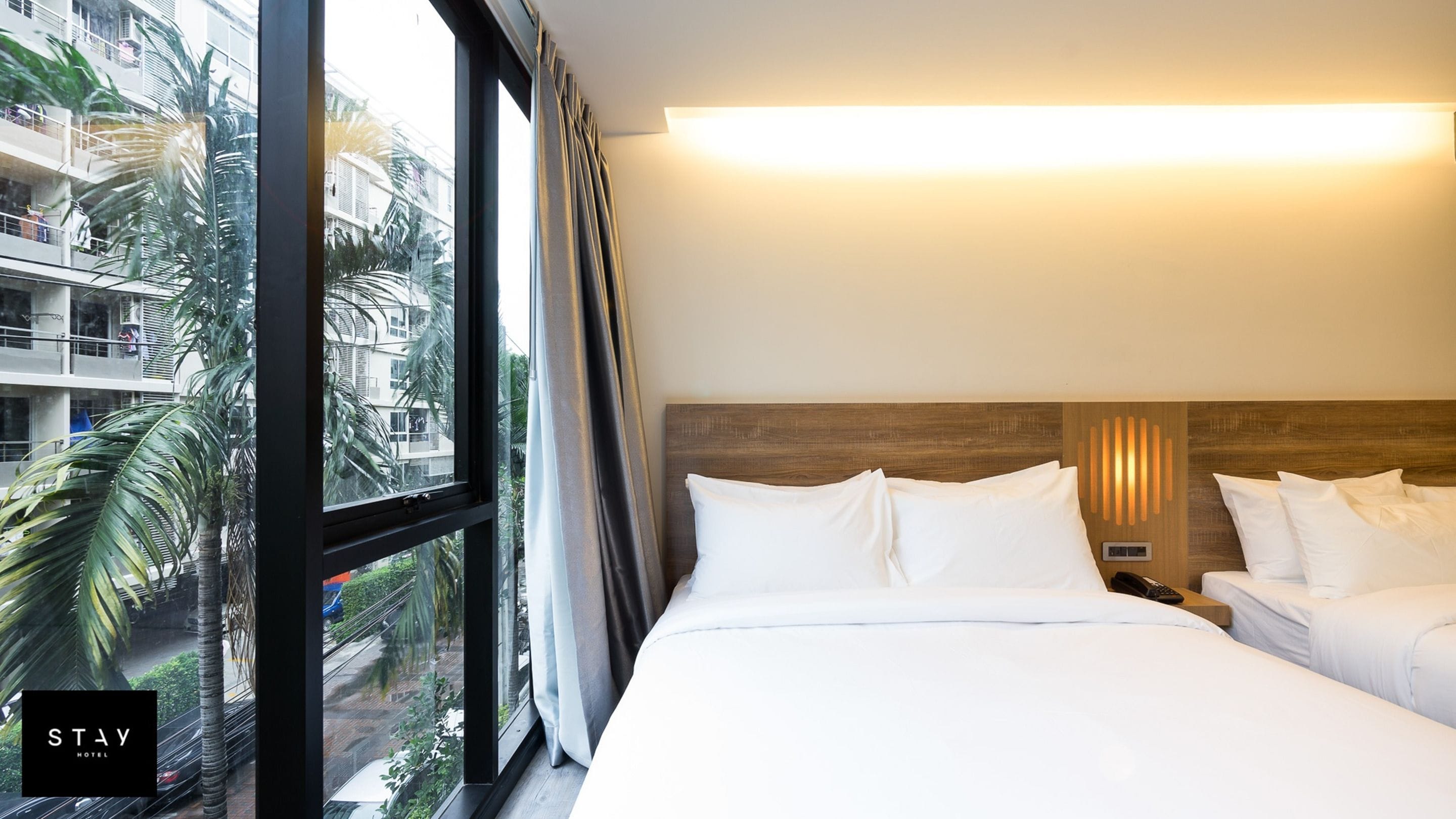 family suite, 2 queen beds | 1 bedroom, in-room safe, blackout curtains, soundproofing