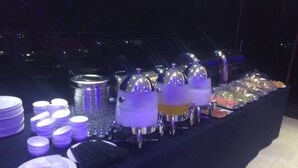 A buffet table with various food containers and utensils. - Hollyston Hotel of Chengdu (Chengdu)