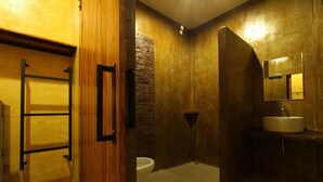 A modern bathroom with a wooden vanity, a sink, and a mirror. - Paradiso Boutique Resort (Trat)