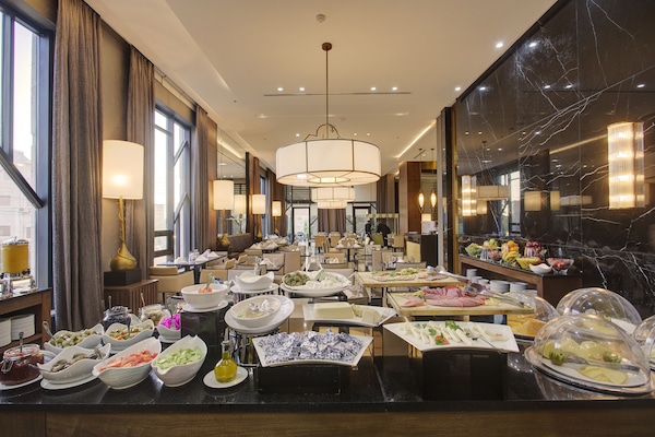 Tägliches inbegriffenes Frühstücksbuffet