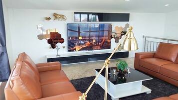 75-inch flat-screen TV with digital channels, TV, Netflix