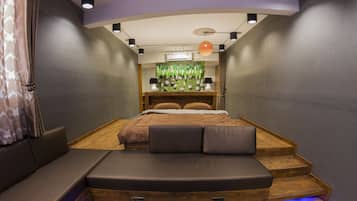 Penthouse 1 | Sala de estar | Televisión de pantalla plana de 55 pulgadas con canales por cable