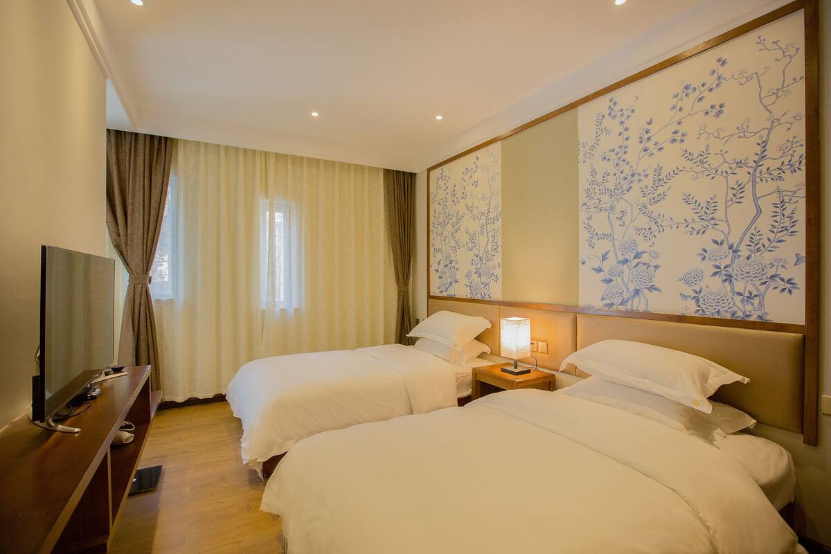 Twin Room | Premium bedding, desk, blackout curtains, iron/ironing board