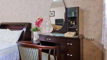 Standard Quadruple Room | Desk, blackout drapes, free WiFi, bed sheets