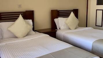 Deluxe Room | 1 bedroom, individually furnished, desk, laptop workspace