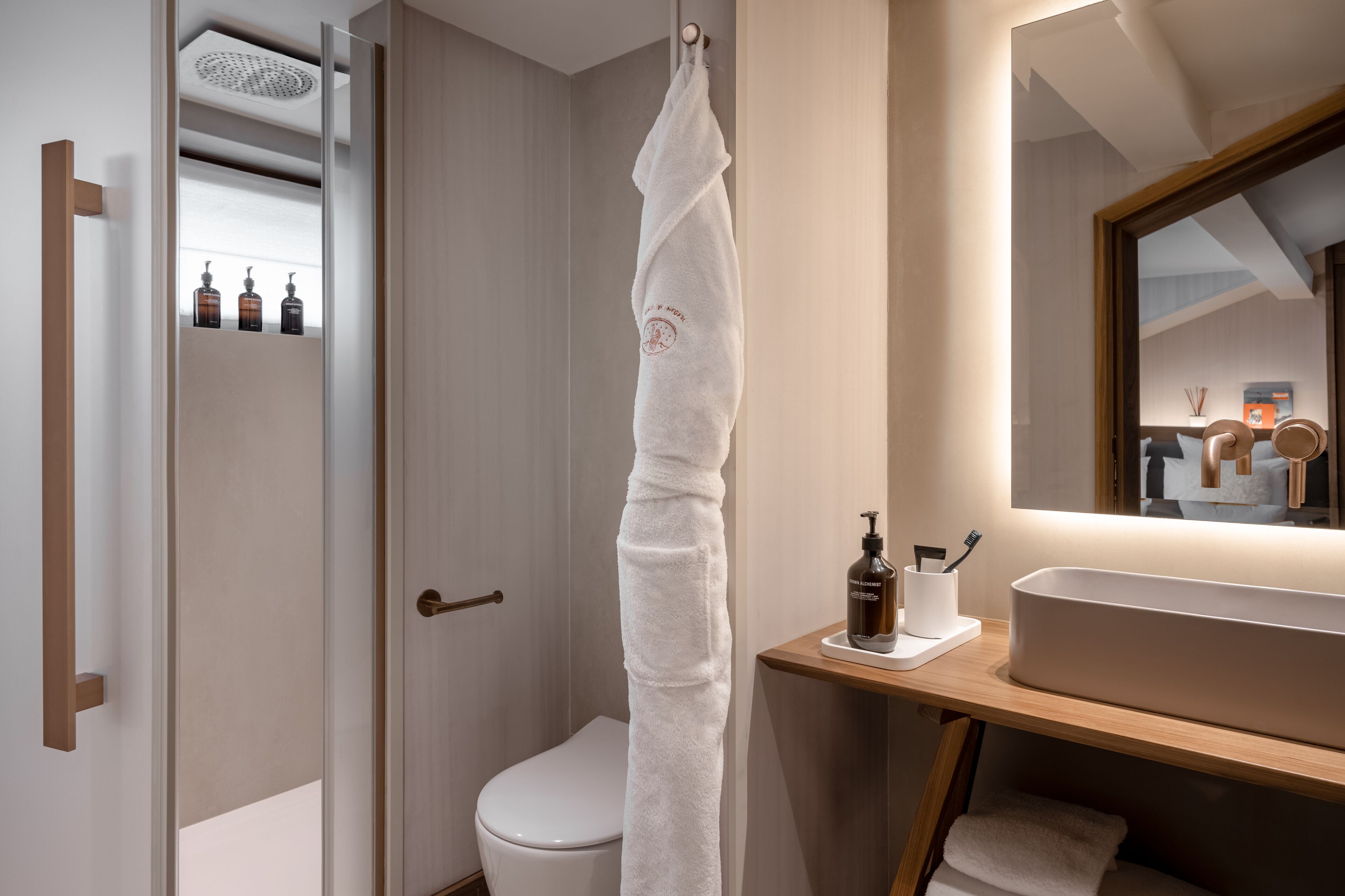 double room | bathroom | rainfall showerhead, designer toiletries, hair dryer, bathrobes