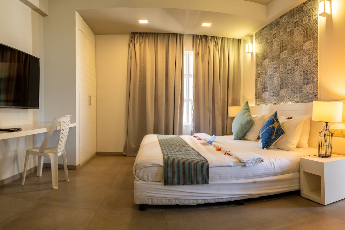 Premier Family Room with Street View | In-room safe, desk, laptop workspace, iron/ironing board