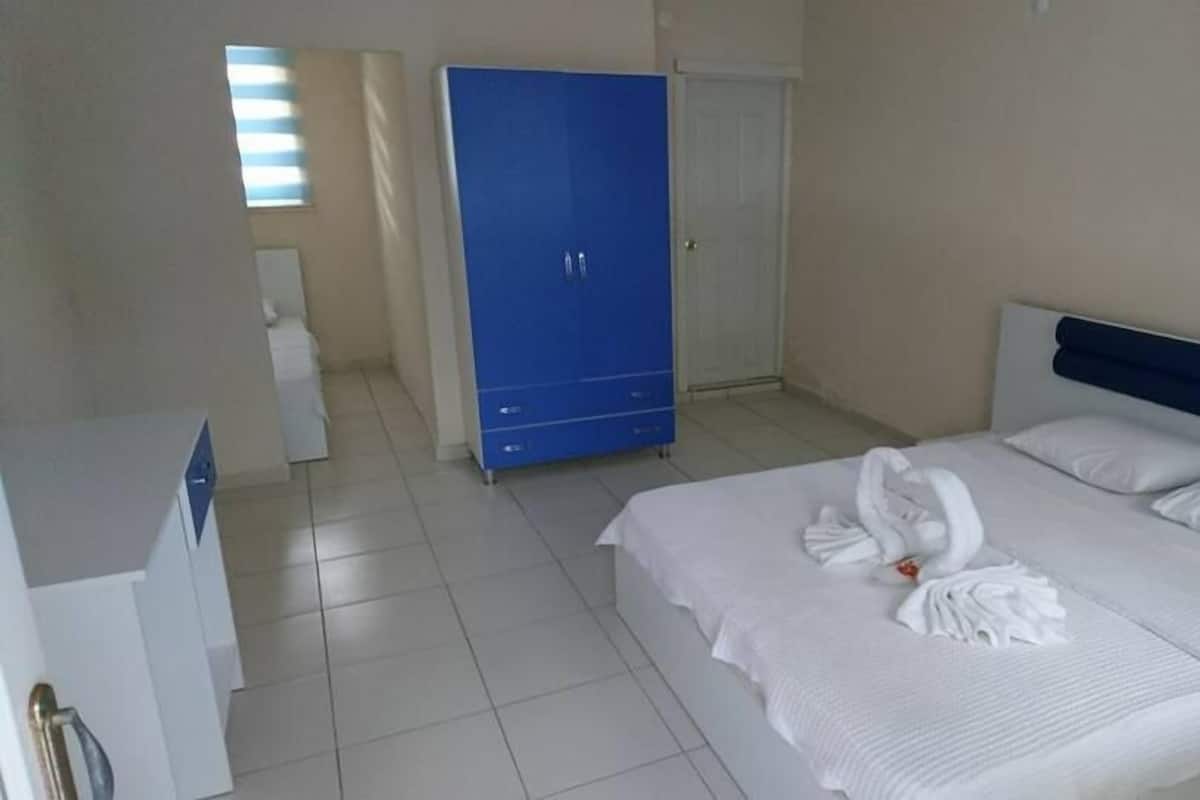 Standard Triple Room | Living area | LED TV