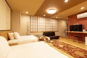 ファミリールーム | 羽毛の掛け布団、客室ごとに異なる装飾、防音設備、アイロン / アイロン台