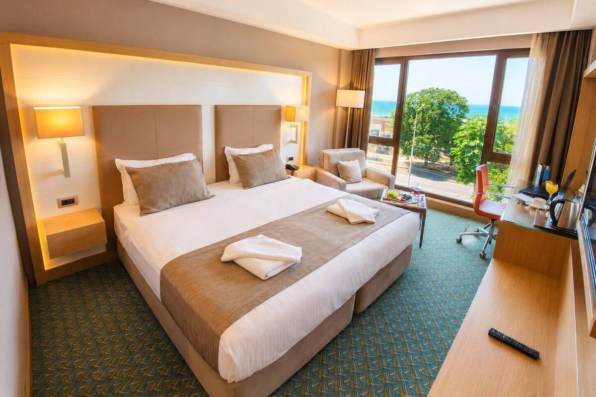 Deluxe Double Room, Sea View | Premium bedding, minibar, in-room safe, desk