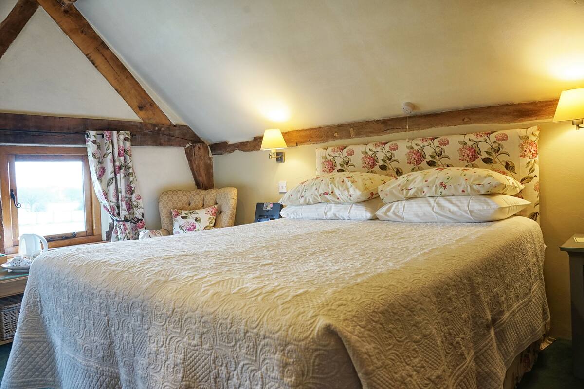 Premium bedding, desk, laptop workspace, soundproofing