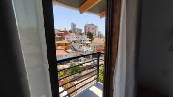 Panoramic Apartment, Multiple Beds, Private Bathroom | Down comforters, blackout drapes, iron/ironing board, free WiFi