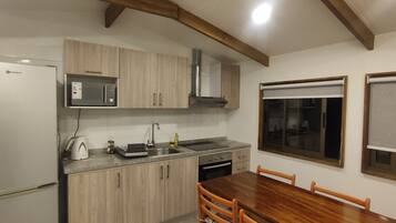 Panoramic Apartment, Multiple Beds, Private Bathroom | Private kitchen | Microwave, stovetop, cookware/dishes/utensils