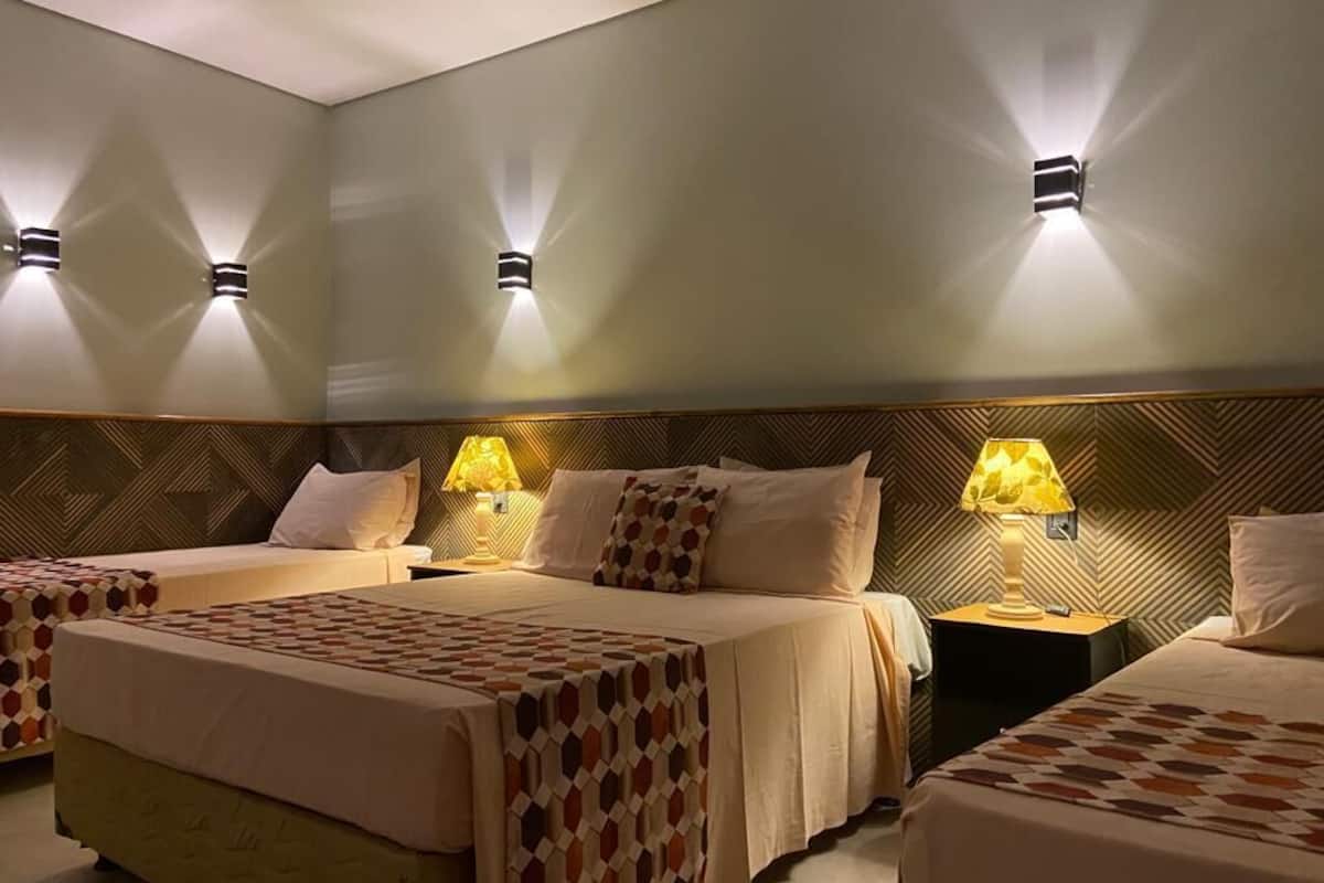 Apartamento Standard QUADRUPLO | 1 多间卧室、迷你吧、遮光窗帘、免费 WiFi