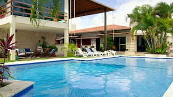 Outdoor pool, open 7:30 AM to 9 PM, pool loungers