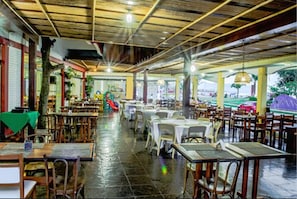 Enjoy a casual dining experience in this welcoming space with a variety of seating options.