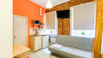 Departamento familiar | Tabla de planchar con plancha, wifi gratis y ropa de cama