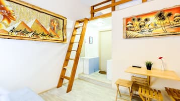 Departamento familiar | Tabla de planchar con plancha, wifi gratis y ropa de cama