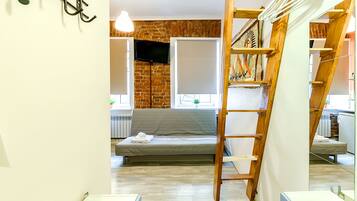 Departamento familiar | Tabla de planchar con plancha, wifi gratis y ropa de cama