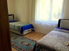 1 bedroom, desk, iron/ironing board, bed sheets