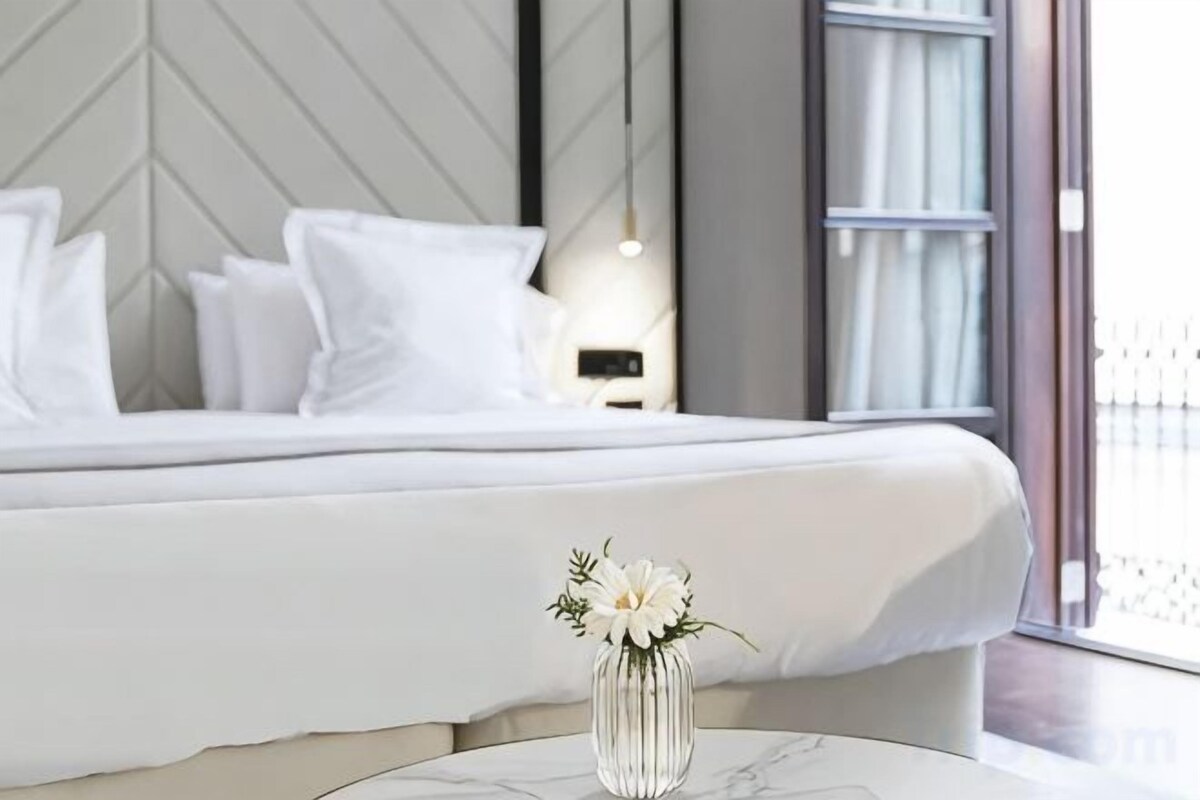 Egyptian cotton sheets, premium bedding, down duvets, memory-foam beds