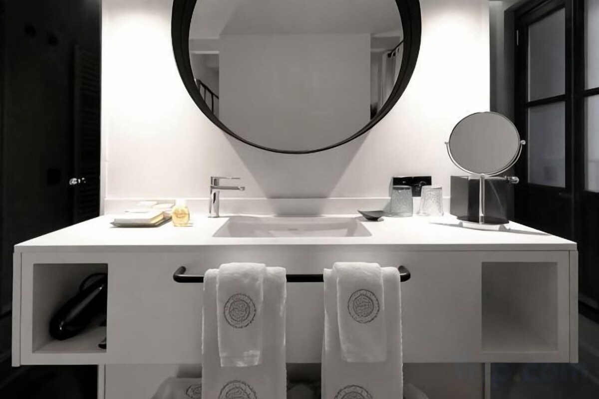 Bathroom | Eco-friendly toiletries, bathrobes, slippers, towels