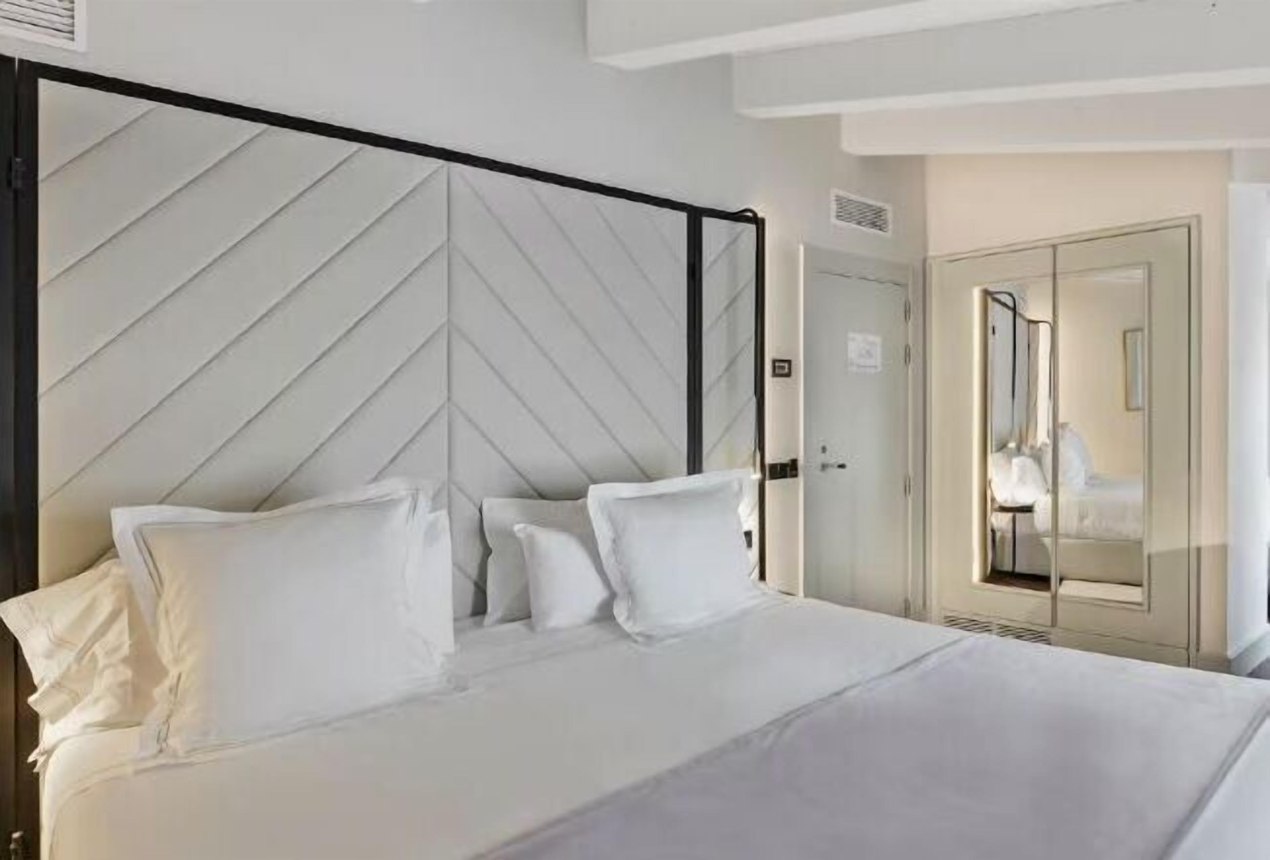 Egyptian cotton sheets, premium bedding, down duvets, memory-foam beds