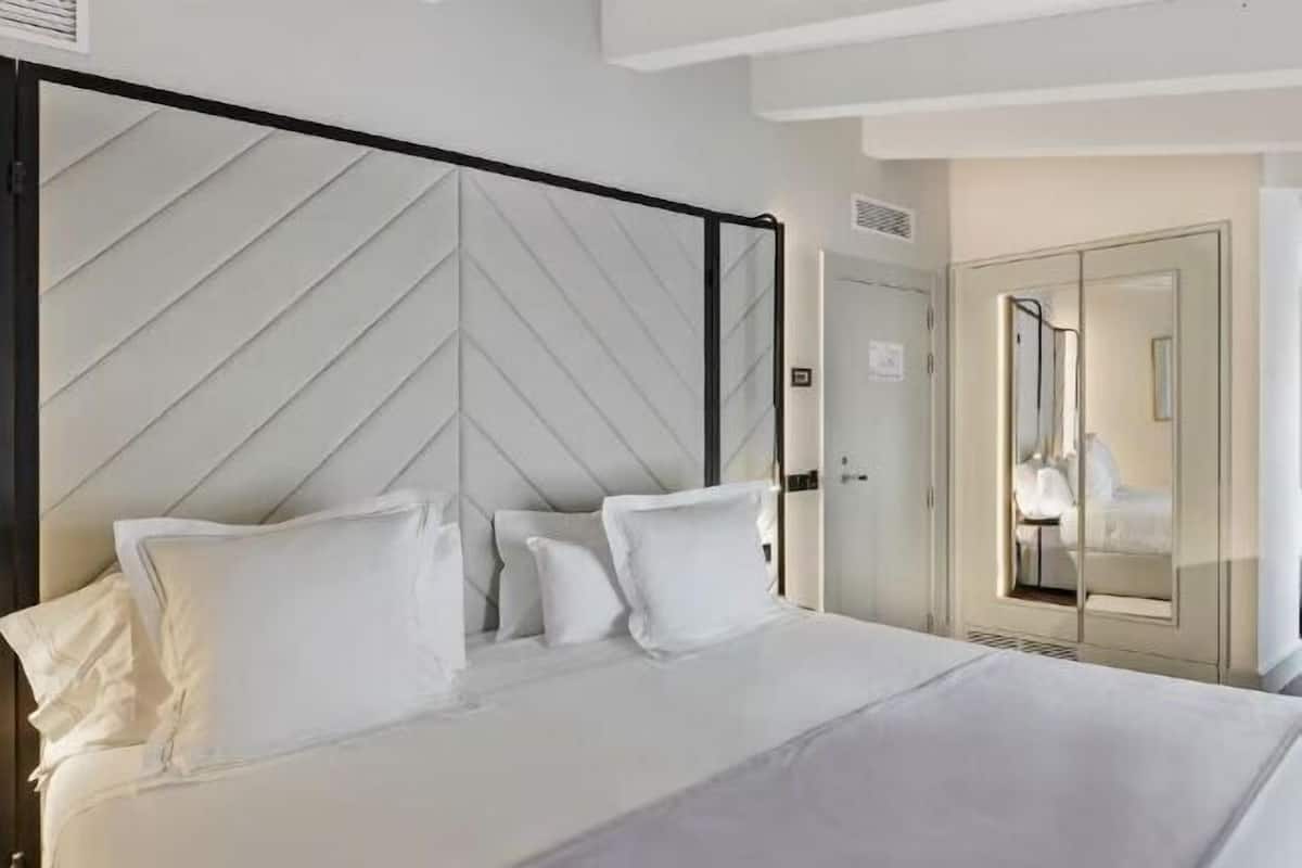 Egyptian cotton sheets, premium bedding, down duvets, memory-foam beds