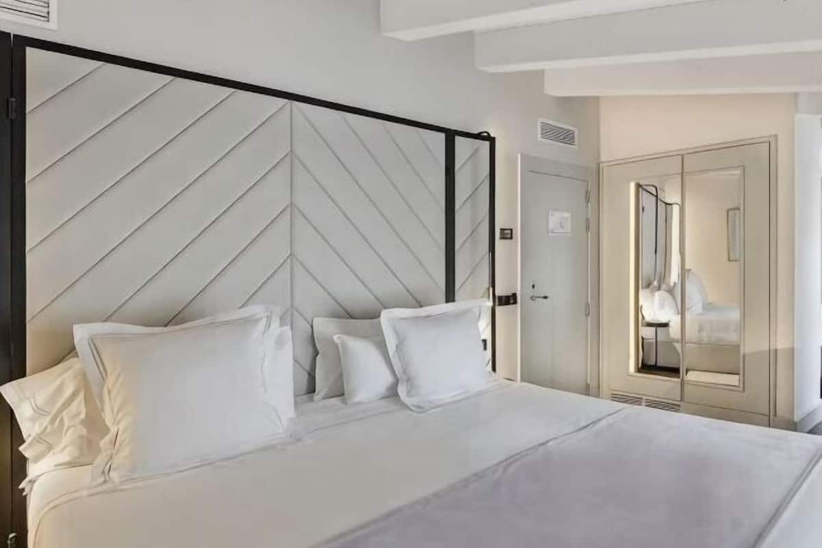 Egyptian cotton sheets, premium bedding, down duvets, memory-foam beds