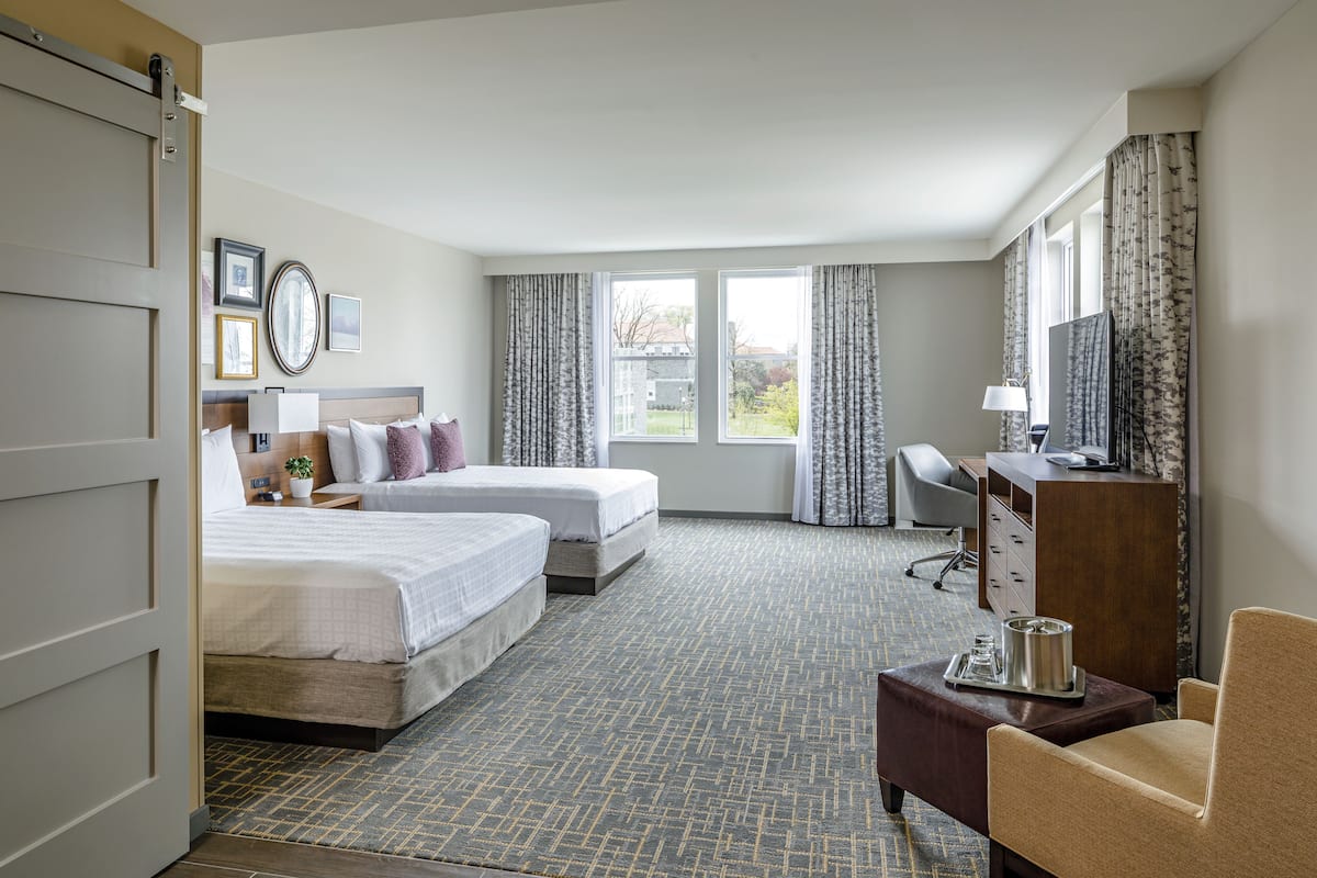 deluxe room, 2 queen beds | premium bedding, in-room safe, desk, blackout curtains