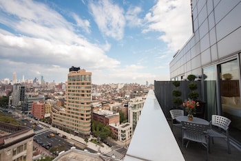 In-room safe, desk, blackout drapes, iron/ironing board at Soho 54