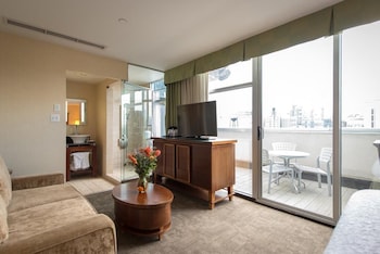 In-room safe, desk, blackout drapes, iron/ironing board at Soho 54