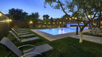 Indoor pool, seasonal outdoor pool, pool umbrellas, pool loungers