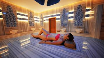 Relax in style with a soothing massage on a comfortable table, surrounded by modern decor and a large mirror.
