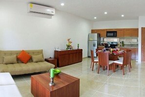 Apartment, 2 Bedrooms | Living area | Flat-screen TV, iPod dock