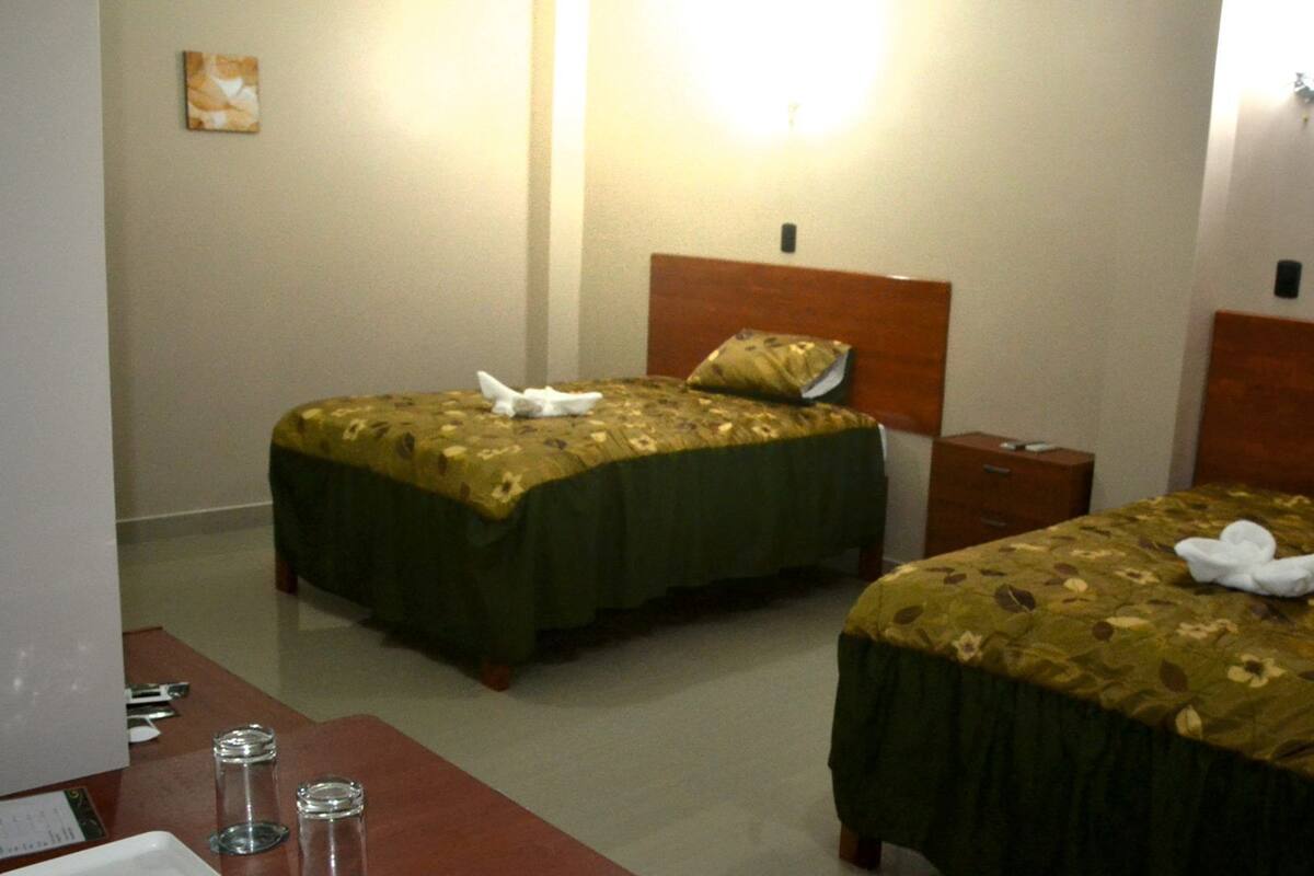 Family Room, 2 Double Beds, Refrigerator | Desk, iron/ironing board (on request), WiFi (free)