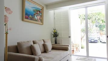 3 Bedroom Villa | Living area | Flat-screen TV