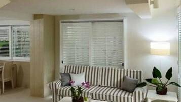 3 Bedroom Villa | Living area | Flat-screen TV