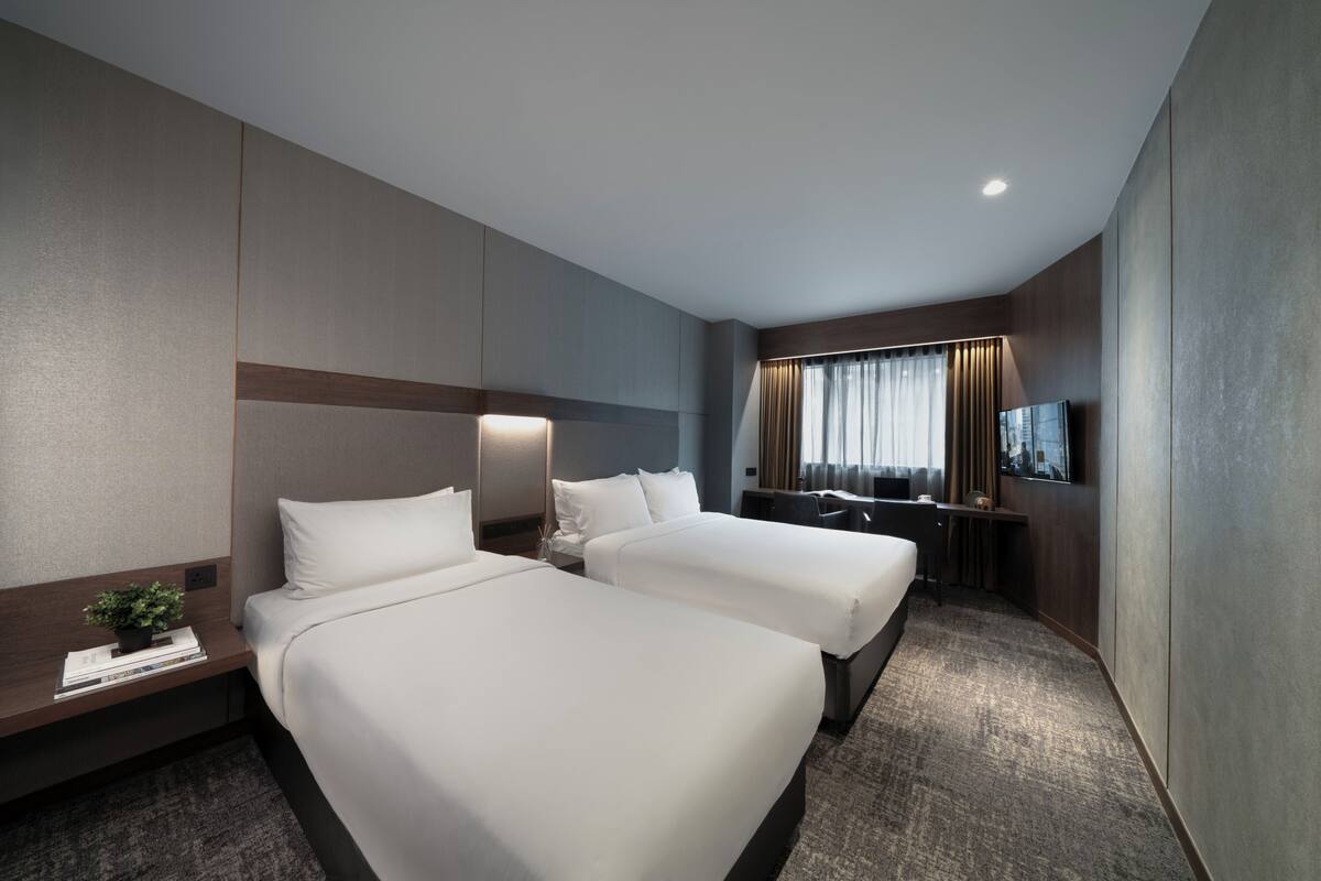 Deluxe Triple Room | In-room safe, desk, iron/ironing board (on request), cribs (free)