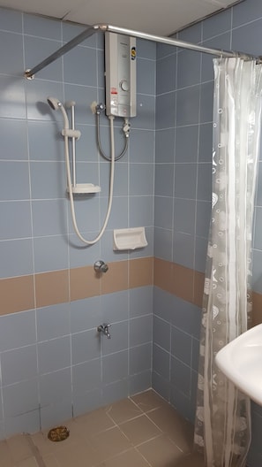 Regadera en el baño