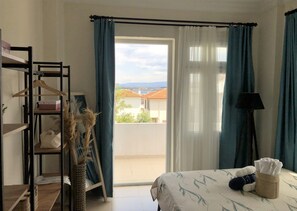 Habitación doble, vista parcial al mar | Escritorio, cunas gratuitas y wifi gratis