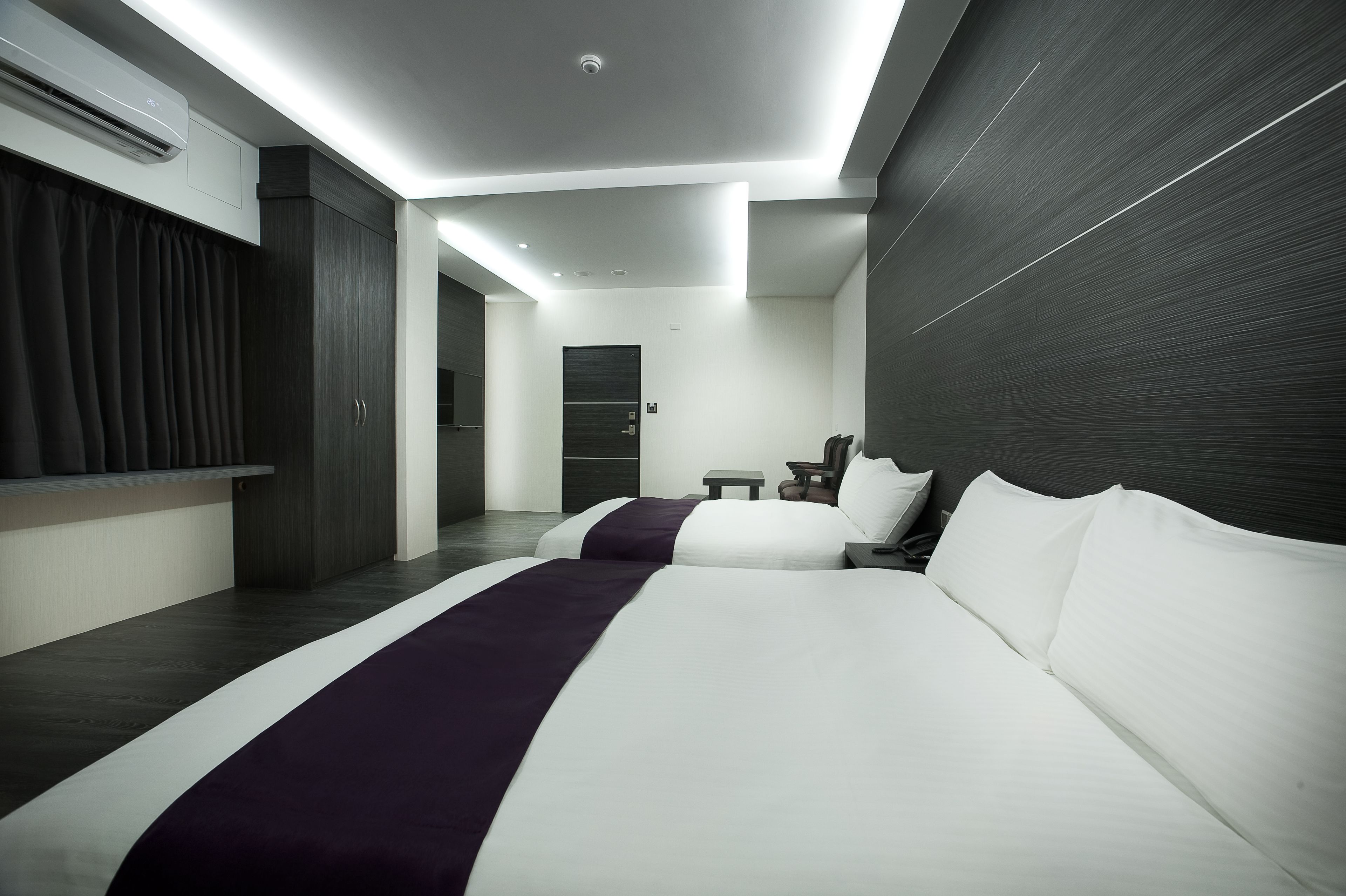 family quadruple room | premium bedding, desk, blackout curtains, soundproofing