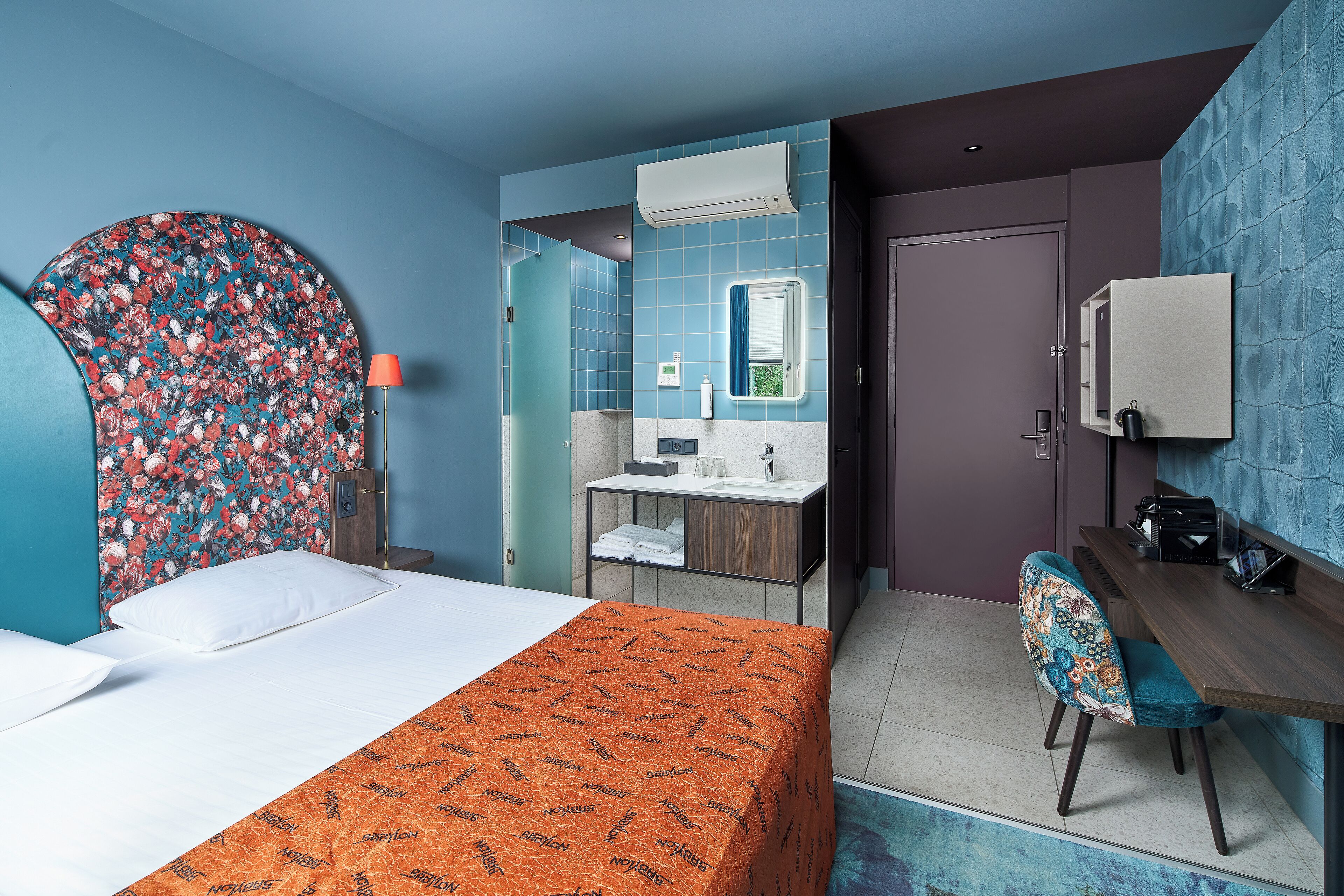 deluxe double room | minibar, in-room safe, desk, iron/ironing board