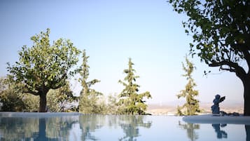 2 outdoor pools, pool umbrellas, pool loungers