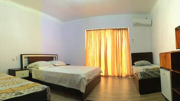 Chambre Triple Luxe | Lits pliants/supplémentaires, Wi-Fi gratuit