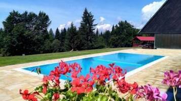 Alberca al aire libre por temporada